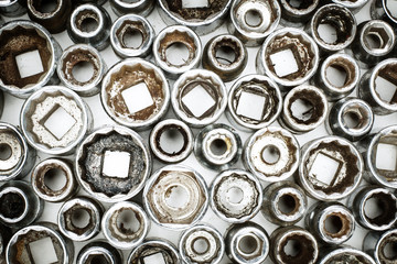 Obraz premium background of many different size sockets for a ratchet