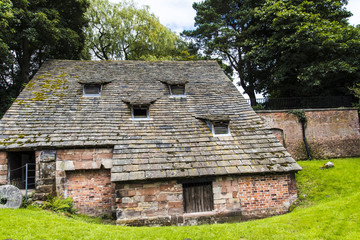 Nether Alderley Mill is a 16th-century watermill located on the  Congleton Road (the A34), to the south of the village of Nether Alderley, Cheshire, England