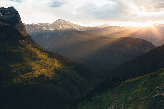 View of mountain range of Glacier National Park during sunrise - Powered by Adobe