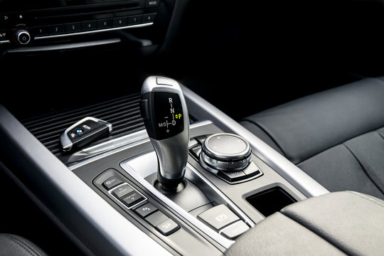 automatic gear stick of a modern car, car interior details