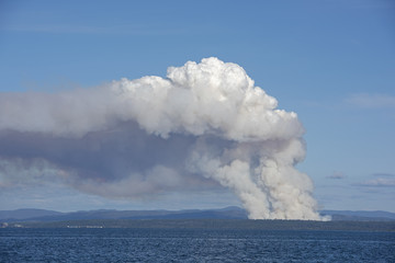 Naklejka na ściany i meble bushfire smoke in Tasmania, Australia.