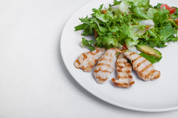 chicken bbq with salad;