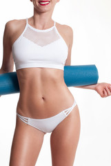 Fototapeta na wymiar Slim and sporty female body, diet concept