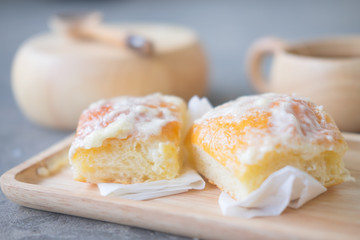 Fresh bread sprinkle with butter and sugar
