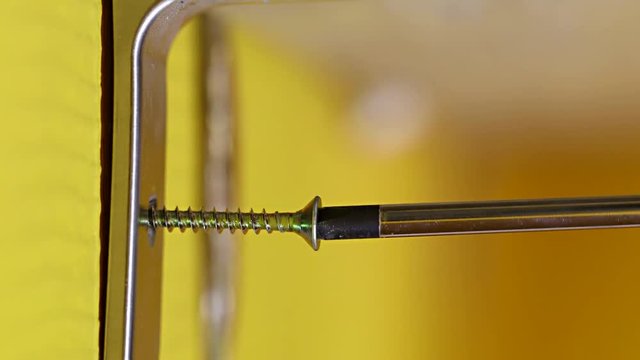 Screwing a metal consol