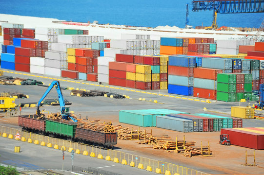 Container, lumber and train in port