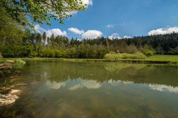 Fototapeta na wymiar Scenic green landscape of Unesco protected regional park Rakov Skocjan in Slovenia during springtime