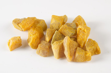 preserved fruits or dry ginger on the background.