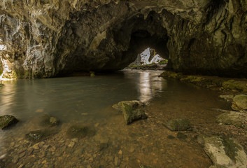 Scenic karst river Rak in Unesco protected Rakov Skocjan national park in Slovenia 
