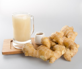 Ginger tea or Ginger tea with haney on background.