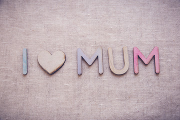 I love mum made from wooden letters and heart shape wood, toning