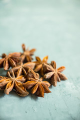 Star anise on the rustic background. Selective focus.