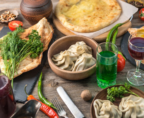 tatar khinkali, khachapuri, on the table, topview