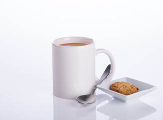 coffee or coffee with cookies on background.