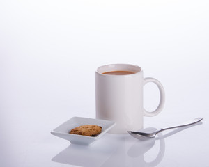 coffee or coffee with cookies on background.
