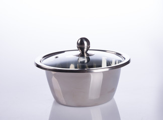 pan or stainless steel pan on background.