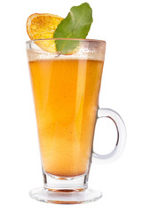 Mulled wine in a glass with a slice of dry orange and a leaf of citrus. Hot warming drink.