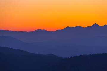 Fototapeta na wymiar Mountains on sunset