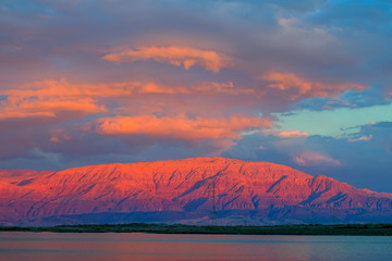 Sunset at the Dead Sea overlooking the mountains of Jordan