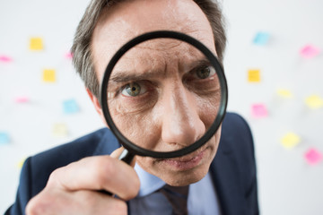 businessman with magnifying glass