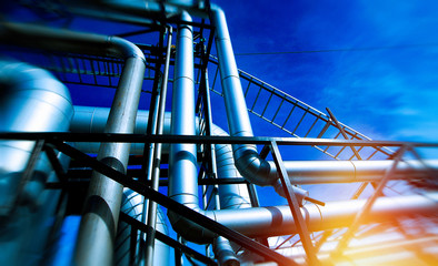 Industrial Factory. Various mechanisms and metal pipes. Toned image. Motion blur effect.