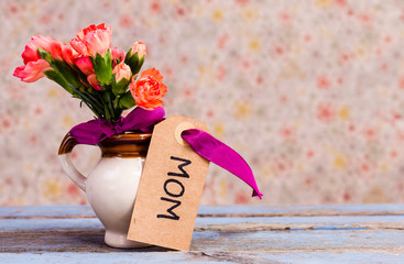 En bukett orange nejlikor till mamma på mors dag  © annaia