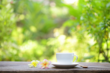 Obraz na płótnie Canvas Coffee and frangipani flower
