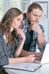 Married couple plans their budget