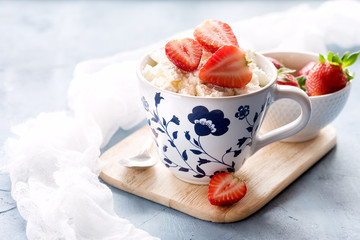 Cottage cheese with berries Fresh strawberry Wooden board Copy space
