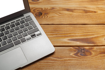 Laptop, notebook on work wooden desk