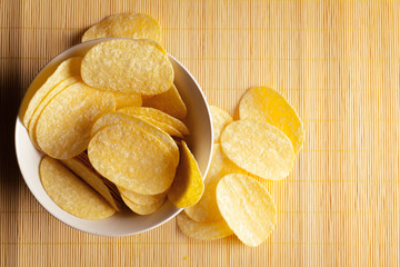 Potato chips in bowl on a table