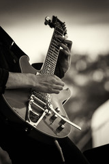 Close up of man playing a guitar - 147879348