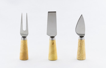 set of cheese knives on white background