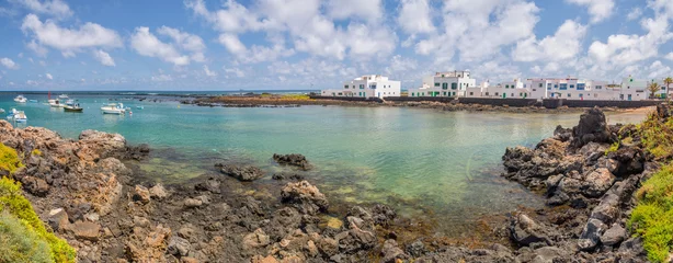 Fotobehang Panorama of the fishing village of Orzola in Lanzarote, Canary islands, Spain © Delphotostock
