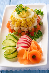 Aspic- jellied chicken with egg and vegetables.