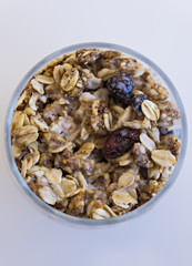 Granola with yogurt in glass cup