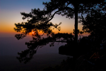 Fototapeta na wymiar Silhouette sunset on the mountain