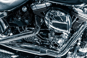 Motorcycle chromium engine exhaust pipes art photography in black and white vintage tone