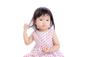 Little asian girl over white background