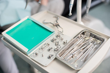 Different professional dental tools in a dentist's office