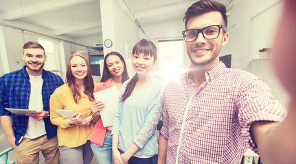 creative business team taking selfie at office