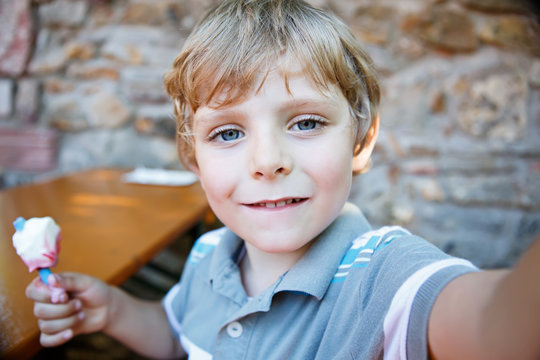 Kid Boy Taking Selfie With Mobile Phone