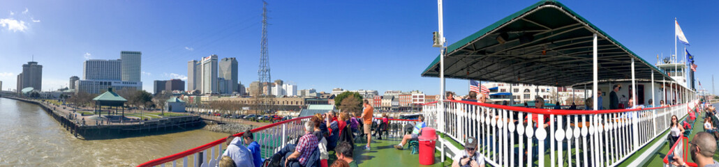 NEW ORLEANS - FEBRUARY 2016: Panoramic view of city skyline from Natchez Steamboat. New Orleans...