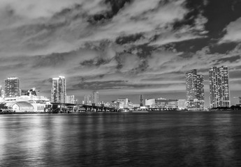 MIAMI, FL - FEBRUARY 27, 2016: City skyline at night. Miami attracts 15 million visitors every year