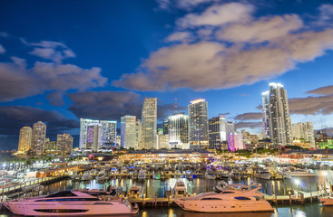 Fototapeta na wymiar Miami at night. Amazing view of Downtown buildings from Port Boulevard