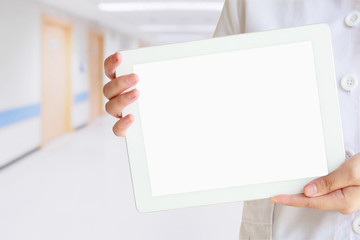 Doctor showing digital tablet with blank screen at the hospital