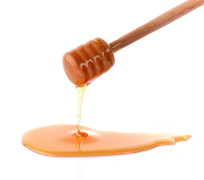 Honey spoon wooden on white background