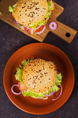 Burger With Beef, Bacon, Egg and Eggplant. View from above, top studio shot