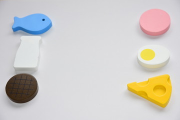 Protein ingredients with wooden toys