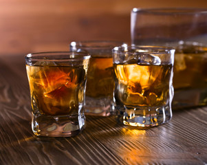 Glasses of whiskey with natural ice